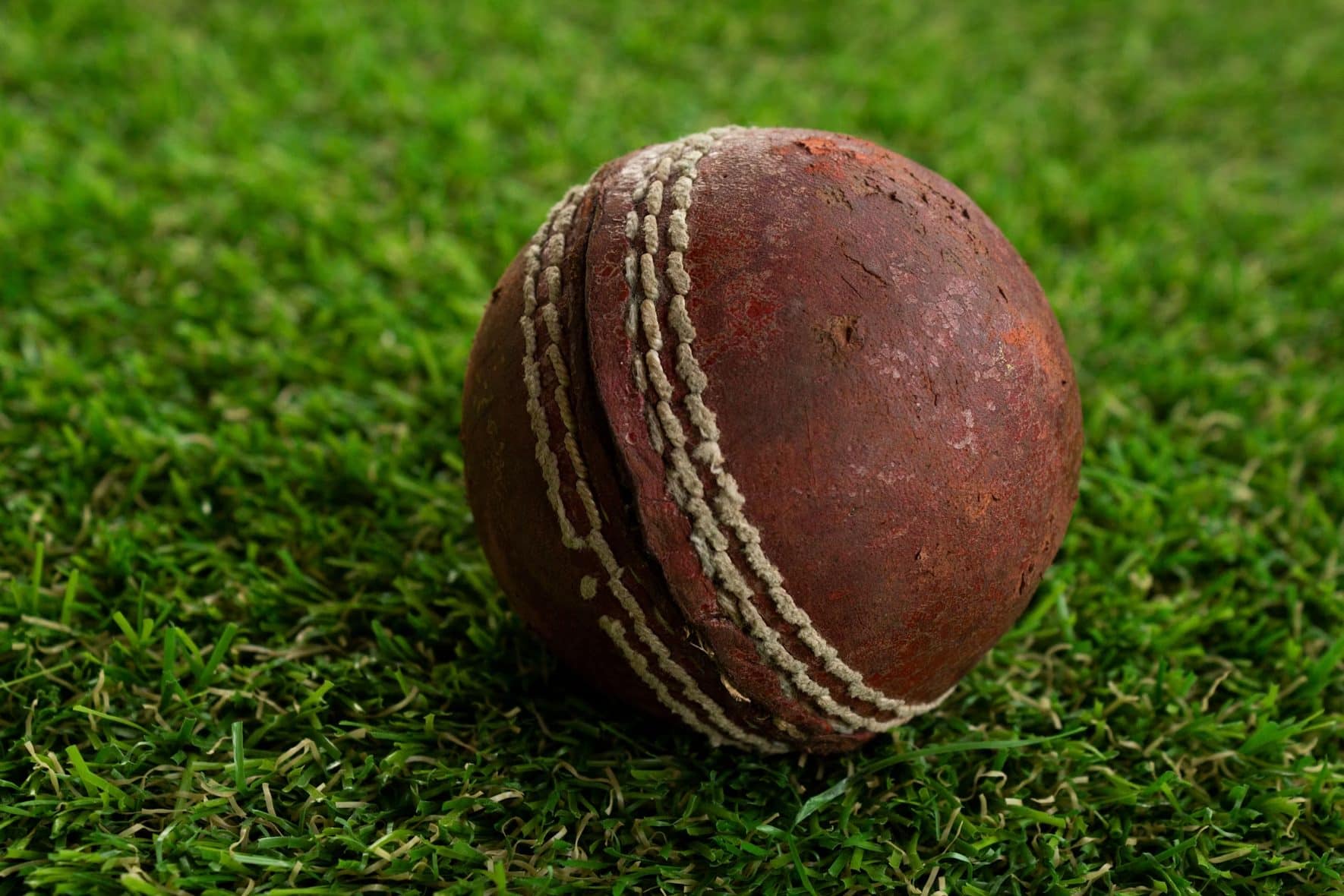 Cricket Ball on Grass Field image